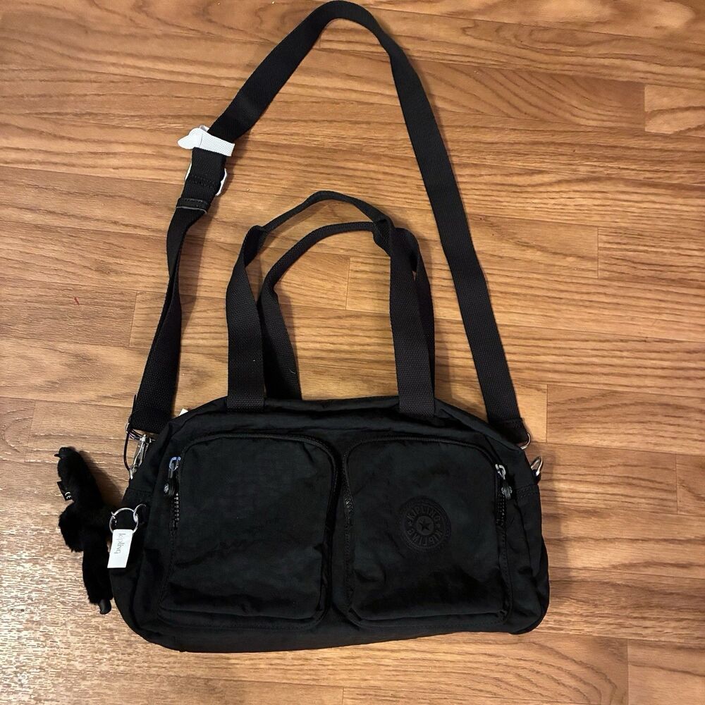 Kipling Black Crossbody Or Hand Bag. 2 Front Pockets. Has Key Chain Monkey